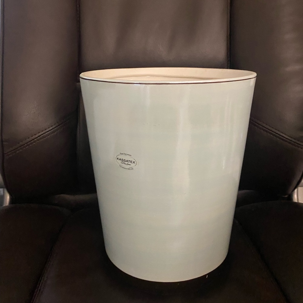 Wastebasket Kassatex Fine Porcelain.Has chip on top edge Light Blue, brown trim.